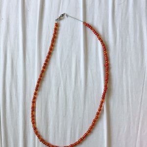 Red and orange beaded necklace